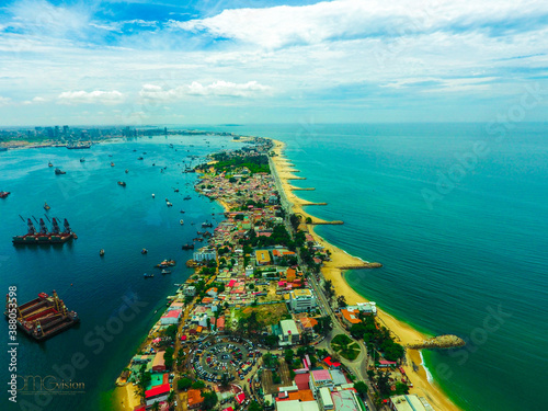 Road, lights and sea at night.
Luanda city captured from the top