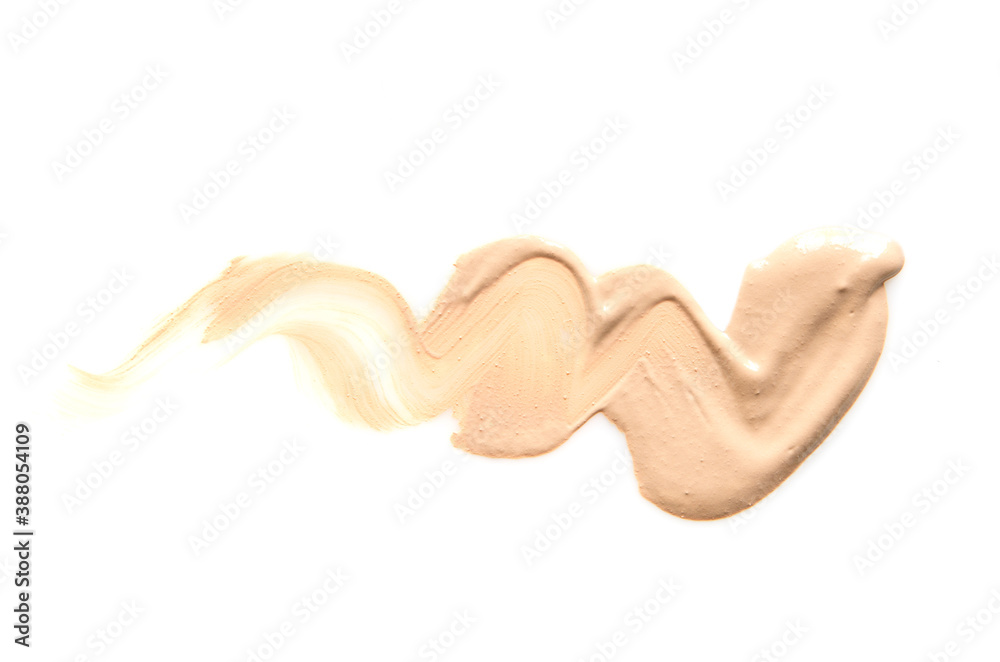 Beige makeup smear of creamy foundation isolated on white background. The concept of fashion and beauty industry. - Image