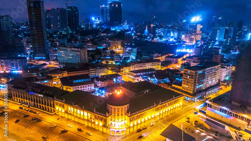 Road, lights and sea at night.
Luanda city captured from the top