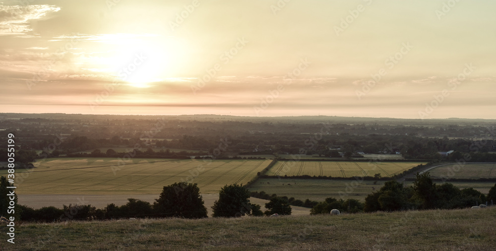 Fototapeta premium Vibrant Sunset Across Irish Meadow Landscape