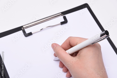 Close-shot, Paper hand with business pen