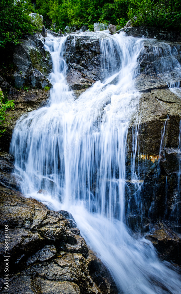 waterfall at the european alps waterfall at the european alps
