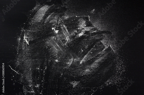 flour on black table