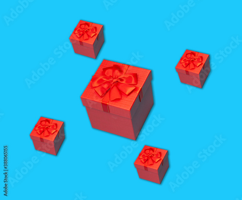 Red gift box with ribbon on...