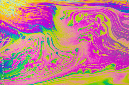 Psychedelic multicolored patterns background. Photo macro shot of soap bubbles