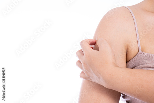 Female scratching her arm isolated white background. Medical, healthcare for advertising concept. photo