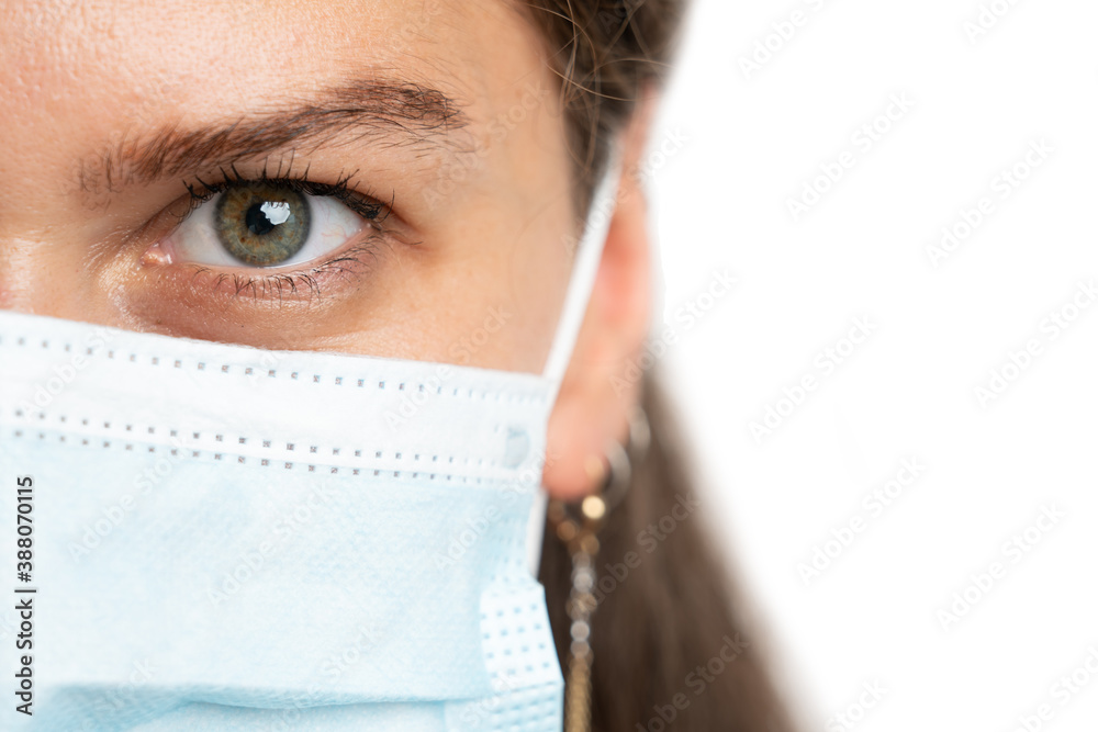 Half face close-up woman wearing protection mask with copyspace Half face close-up woman wearing protection mask with copyspace