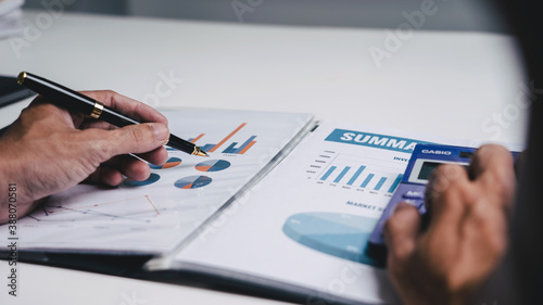 Businessman Asian people individual checking income tax form financial paper document at office.