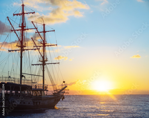Old Ship expedition at sunrise. Travel and freedom concept.