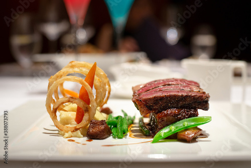  sliced medium rare fine beef steak with delicious gravy sauce