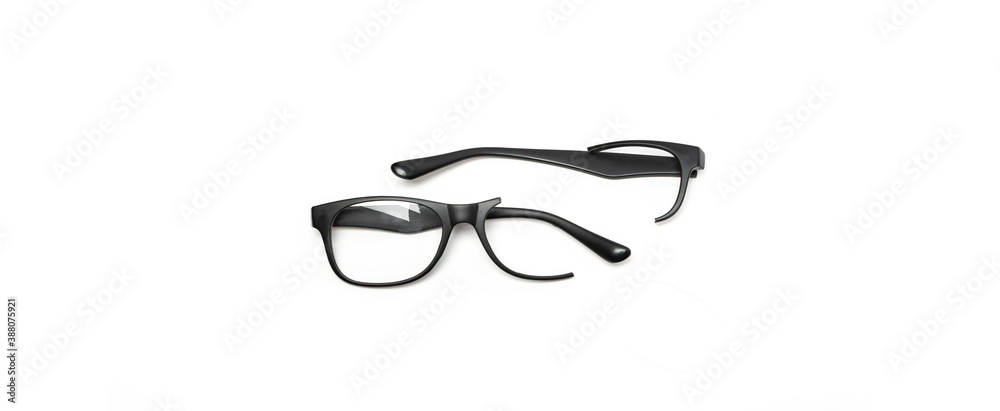 Black Broken Eyeglasses on Panorama White Background Stock Photo