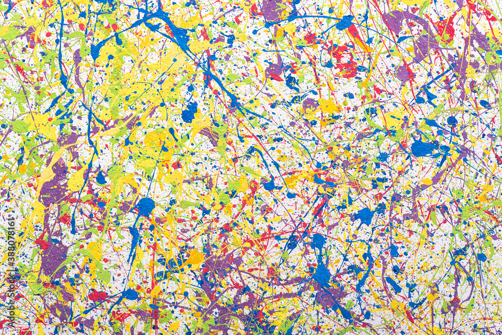 Background with multi-colored splashes of paint on the wall. Colored Background with multi-colored splashes of paint on the wall. Colored
