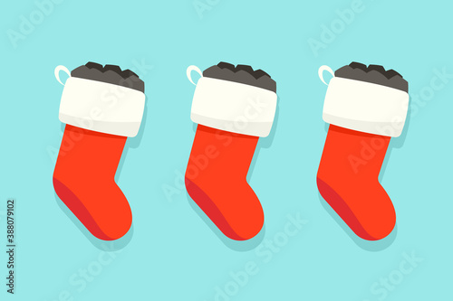 Three Christmas stockings with coal illustration. Clipart image.