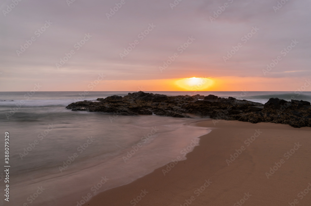 Early morning beach sunrise in South Africa long exposure