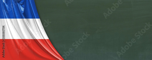 Foto Kreidetafel mit der Flagge vom Bundesland Schleswig-Holstein, Banner