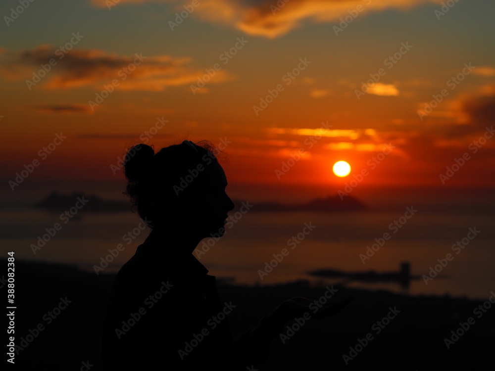 The woman shadow with the sunset.