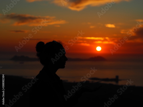 The woman shadow with the sunset.