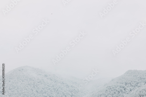 View of the snow-covered mountains. Krasnaya Polyana, Sochi, Russia Ski resort © NEZNAEV