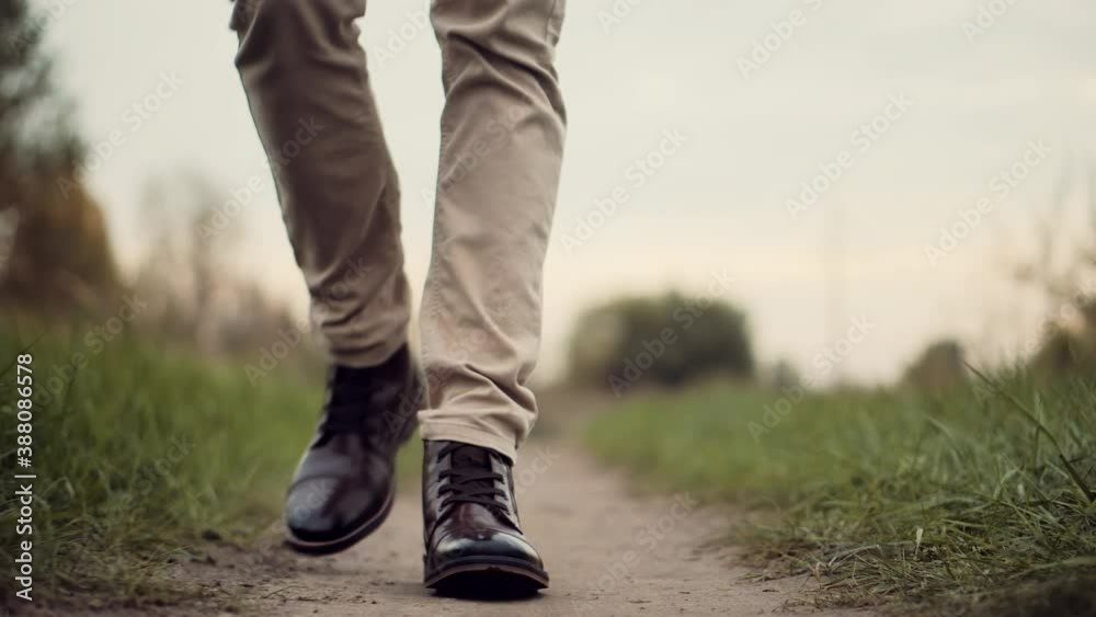Confidence Man Feet Walking On Road.Lonely Handsome Guy Rest On Holiday.Man Legs In Chelsea Boot Walking On Park.Businessman Legs On Sneakers Relaxing At Fall.Male In Leather Shoes Walk Autumn Road. Confidence Man Feet Walking On Road.Lonely Handsome Guy Rest On Holiday.Man Legs In Chelsea Boot Walking On Park.Businessman Legs On Sneakers Relaxing At Fall.Male In Leather Shoes Walk Autumn Road.