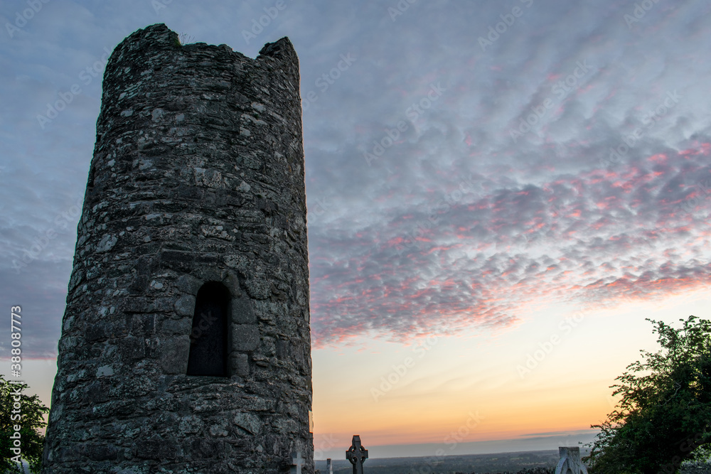 Ancient Irish Round Tower at Sunrise