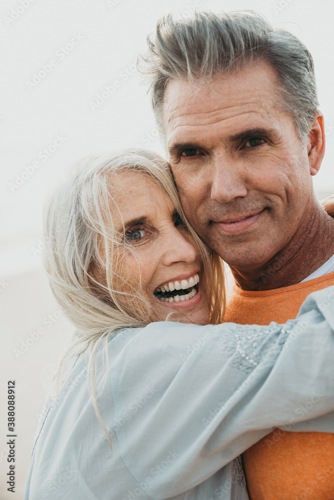 Happy senior couple spending time at the beach. Concepts about love,seniority and people Happy senior couple spending time at the beach. Concepts about love,seniority and people
