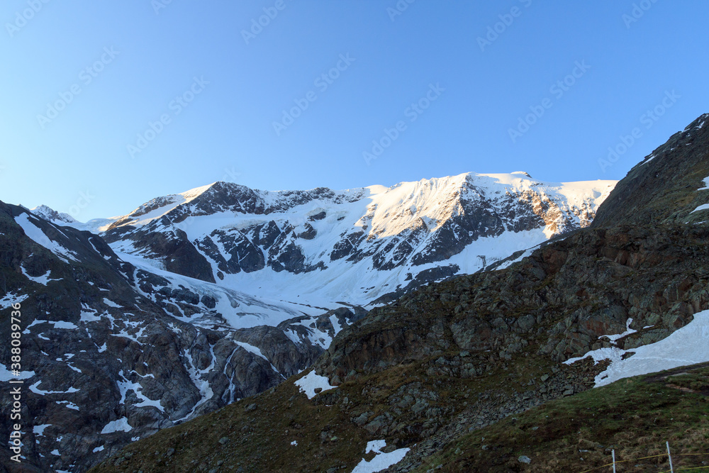 Mountain snow panorama with glacier Taschachferner and blue sky in Tyrol Alps, Austria