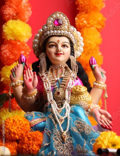 Lakshmi pujan - godess laxmi idol with Copper Kalash and coconut 