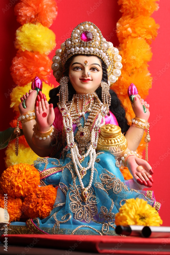 Idol worshipping of Hindu Goddess Lakshmi - Lakshmi Puja is a Hindu religious festival Idol worshipping of Hindu Goddess Lakshmi - Lakshmi Puja is a Hindu religious festival