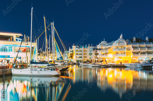 Benalmadena, Spain. Night Scenery View Of Floating Houses, Vessel In Puerto Marina. Malaga Region, On The Costa Del Sol. It Caters For A Large Number Of Tourists photo