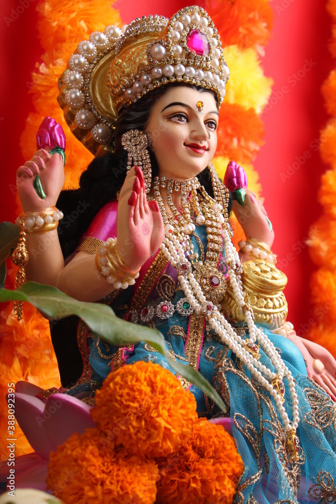 Idol worshipping of Hindu Goddess Lakshmi - Lakshmi Puja is a Hindu religious festival Idol worshipping of Hindu Goddess Lakshmi - Lakshmi Puja is a Hindu religious festival