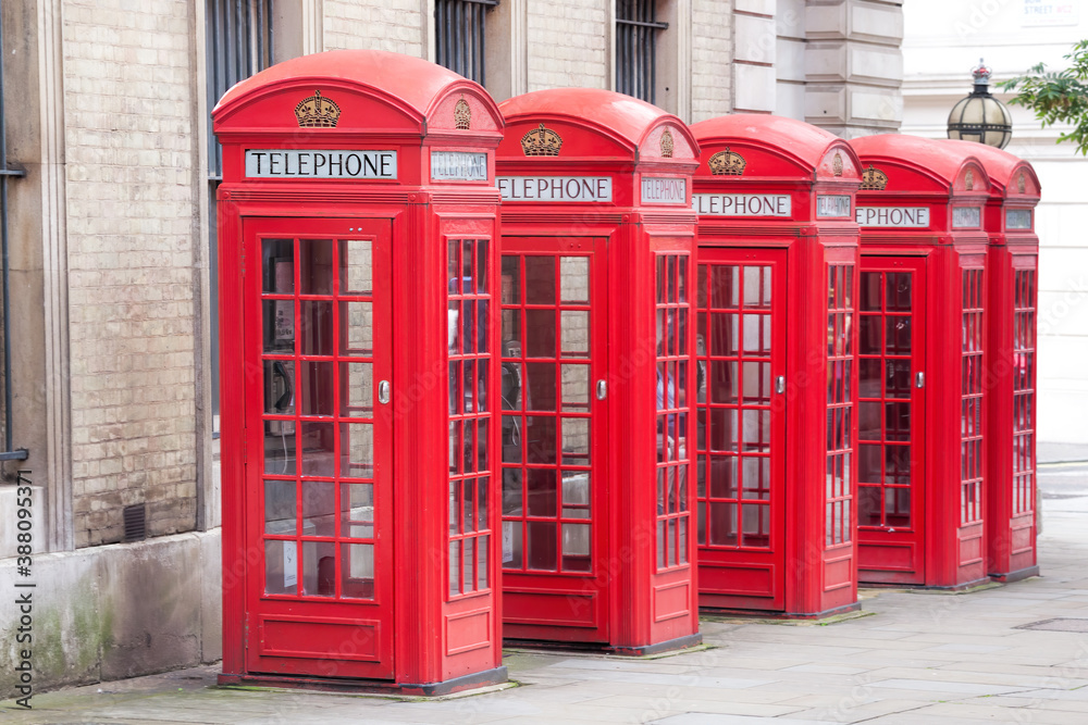 Famous red telephone booths in Covent Garden street, London, England Famous red telephone booths in Covent Garden street, London, England