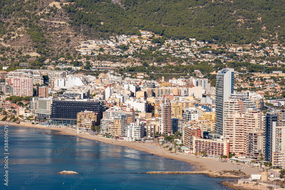 Coastal landscape with buildings on the seashore, Calpe city, Alicante, with tall buildings