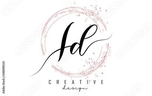 Handwritten ID I D letter logo with sparkling circles with pink glitter.