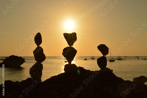 Sunset over the stunning beaches of the island of Boracay and hiking at the Taal Volcano lake in the Philippines photo