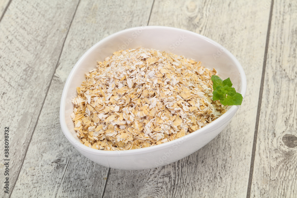 Raw oats in the bowl Raw oats in the bowl