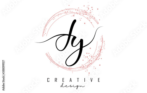 Handwritten JY J Y letter logo with sparkling circles with pink glitter.