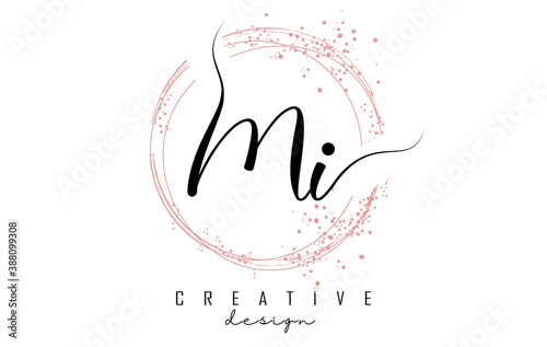 Handwritten MI M I letter logo with sparkling circles with pink glitter.