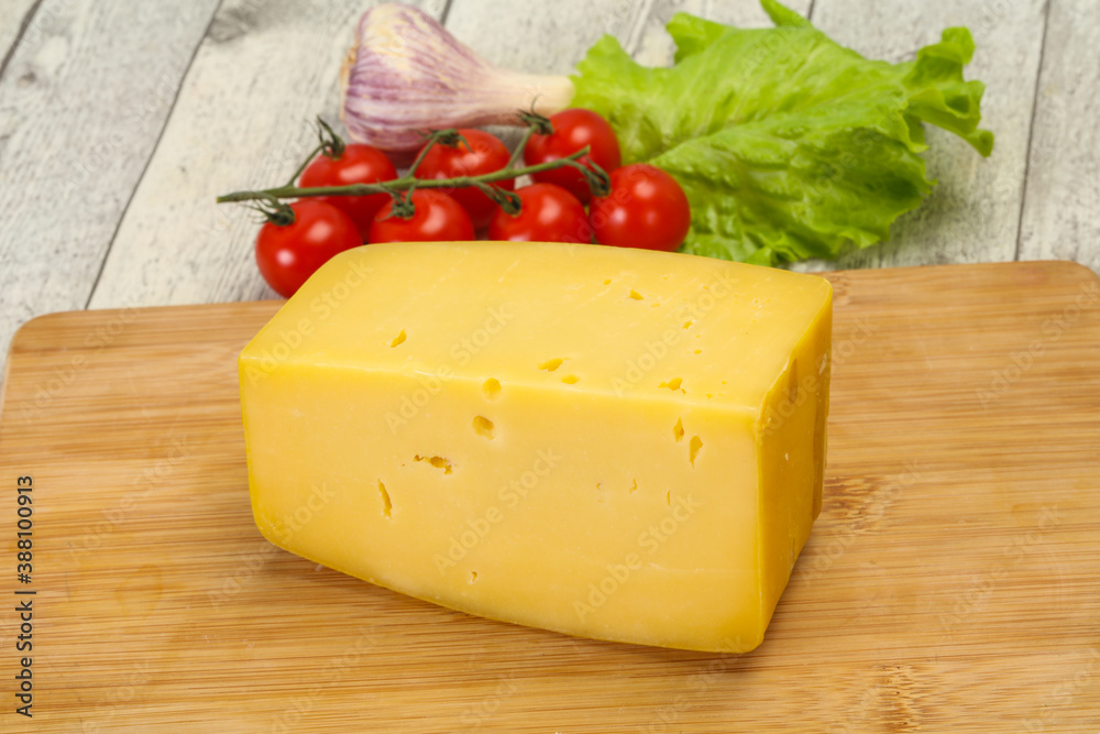 Hard yellow tasty cheese brick Hard yellow tasty cheese brick