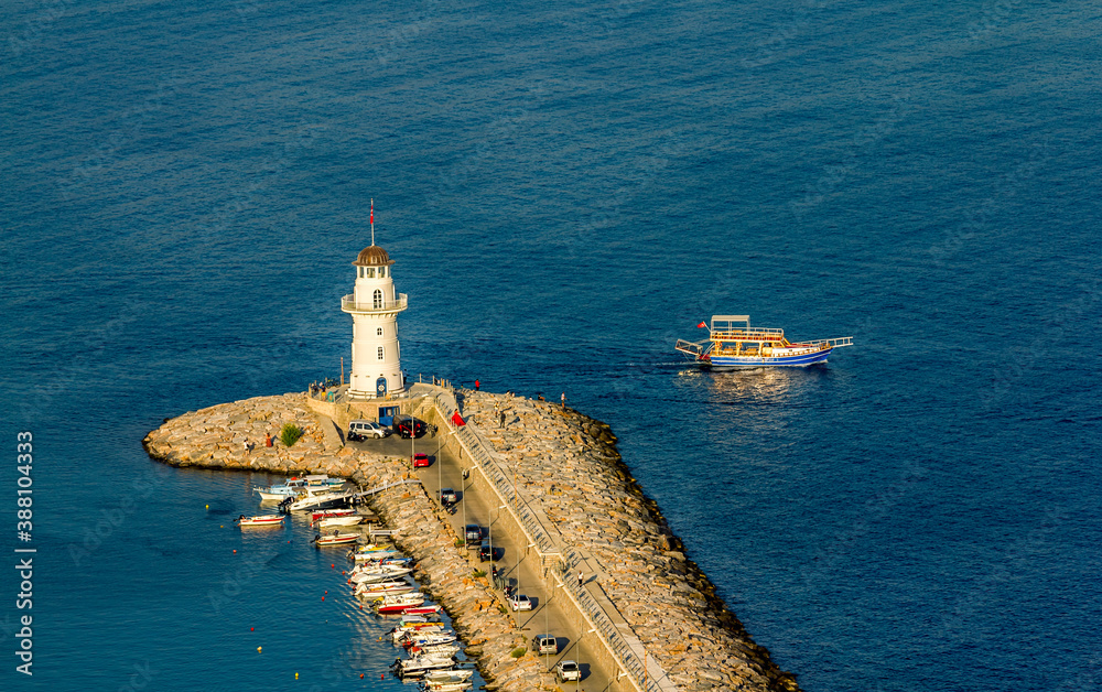Lighthouse  in the Harbor in Alanya in Turkey at sunset