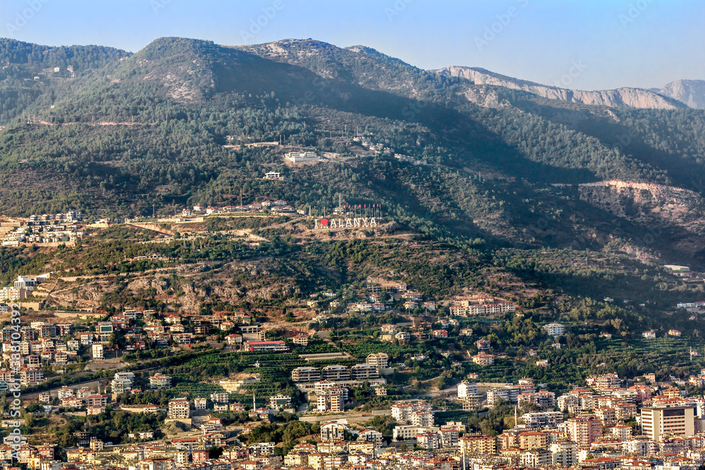 View of the roofs and the city of Alanya in Turkey from the height of the mountains
