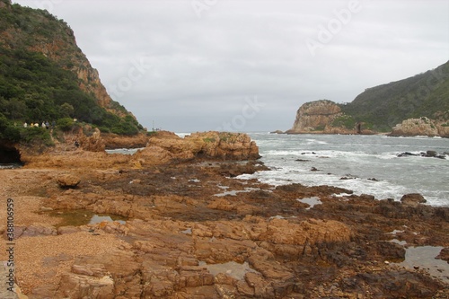 The Knysna Heads, sandstone cliffs that separate the Knysna Lagoon from the pacific ocean. A famous landmark along the renowned Garden Route, South Africa, Africa.