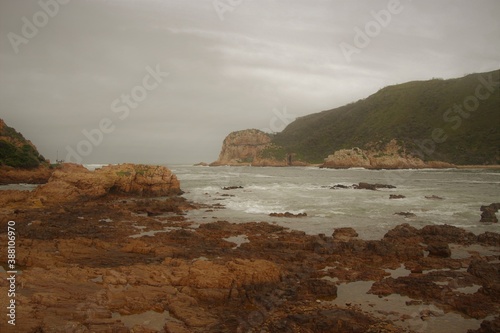The Knysna Heads, sandstone cliffs that separate the Knysna Lagoon from the pacific ocean. A famous landmark along the renowned Garden Route, South Africa, Africa.