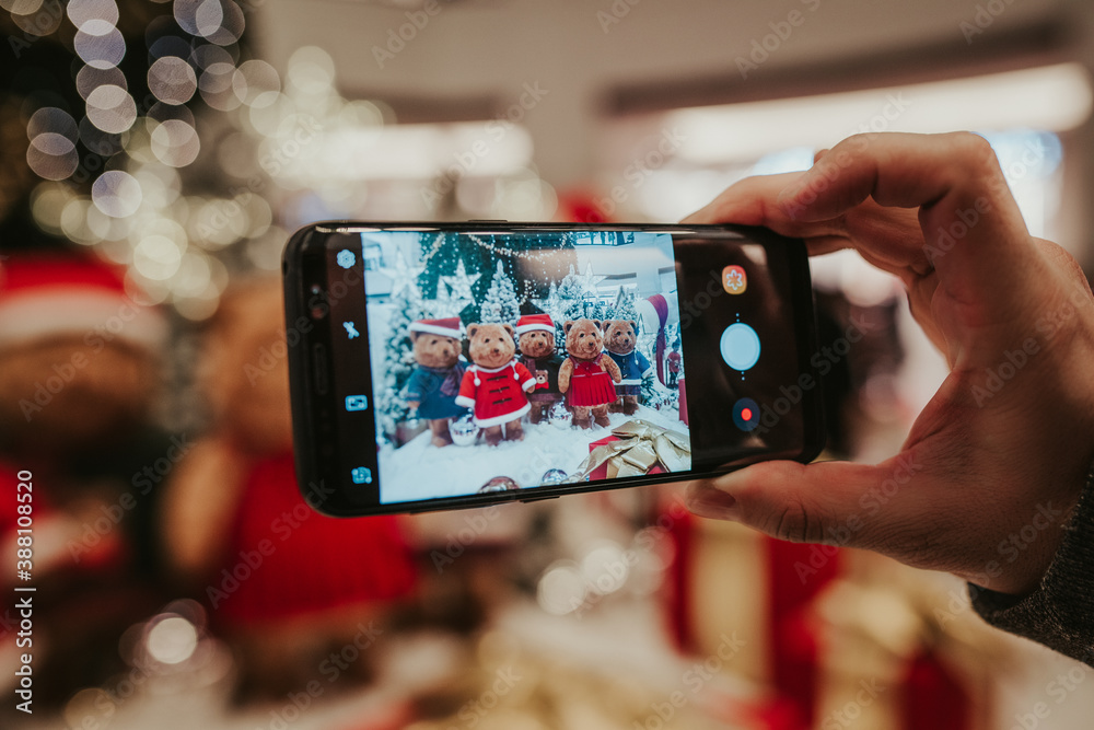 person taking a picture with a phone person taking a picture with a phone