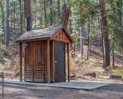 Rustic Wooden Vault Toilet that serves as the restroom facilities provided by the Forest Service at Drews Creek Campground