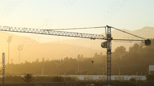 crane at sunset