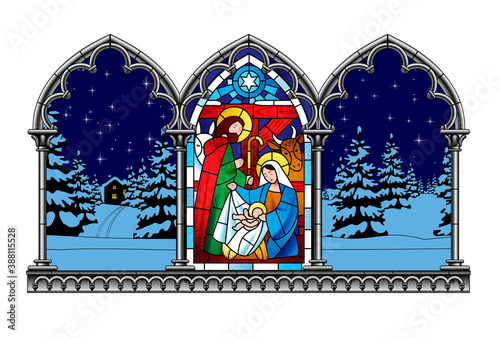 Stained glass window depicting a Christmas scene in an engraved gothic frame on a winter background