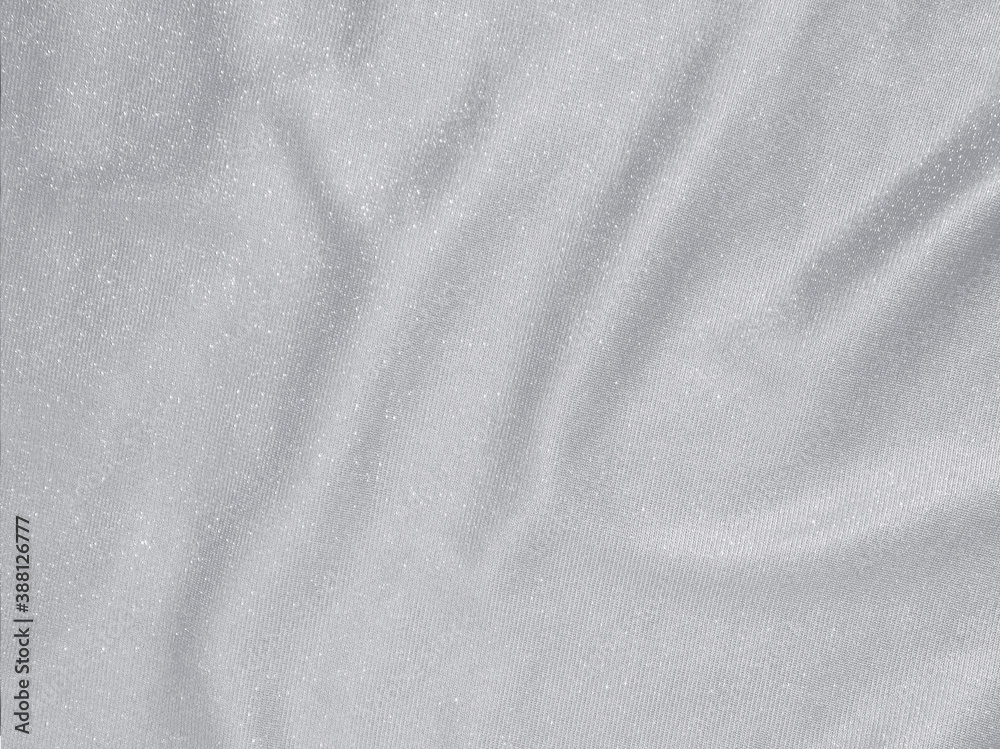 Shiny silver crumpled fabric texture background Shiny silver crumpled fabric texture background