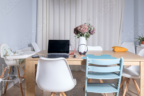 Bilde på lerret Interior home scene of home working on a family home with laptop and everything