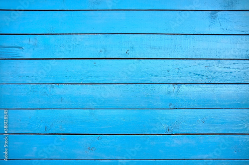Blue wooden painted planks background.