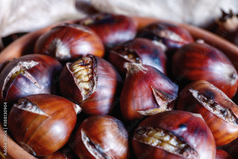 Chestnuts cooked on the grill, ready to eat. Chestnuts cooked on the grill, ready to eat.